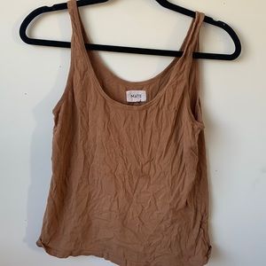 Brown/terracotta tank